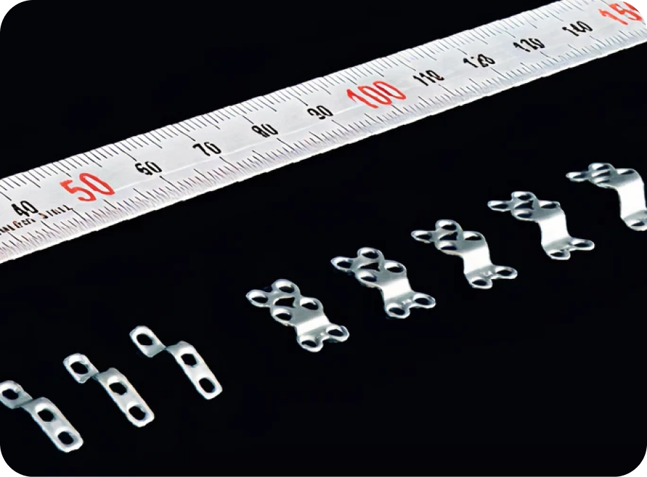 Pre-bent titanium plates
